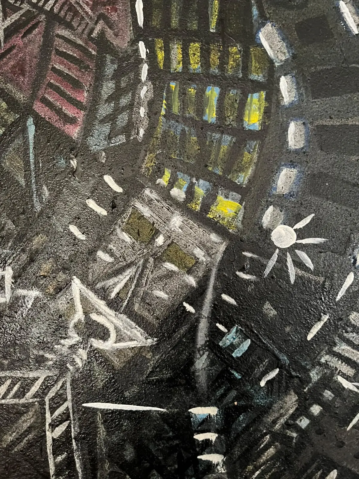 Detail — lit windows and a radiating star