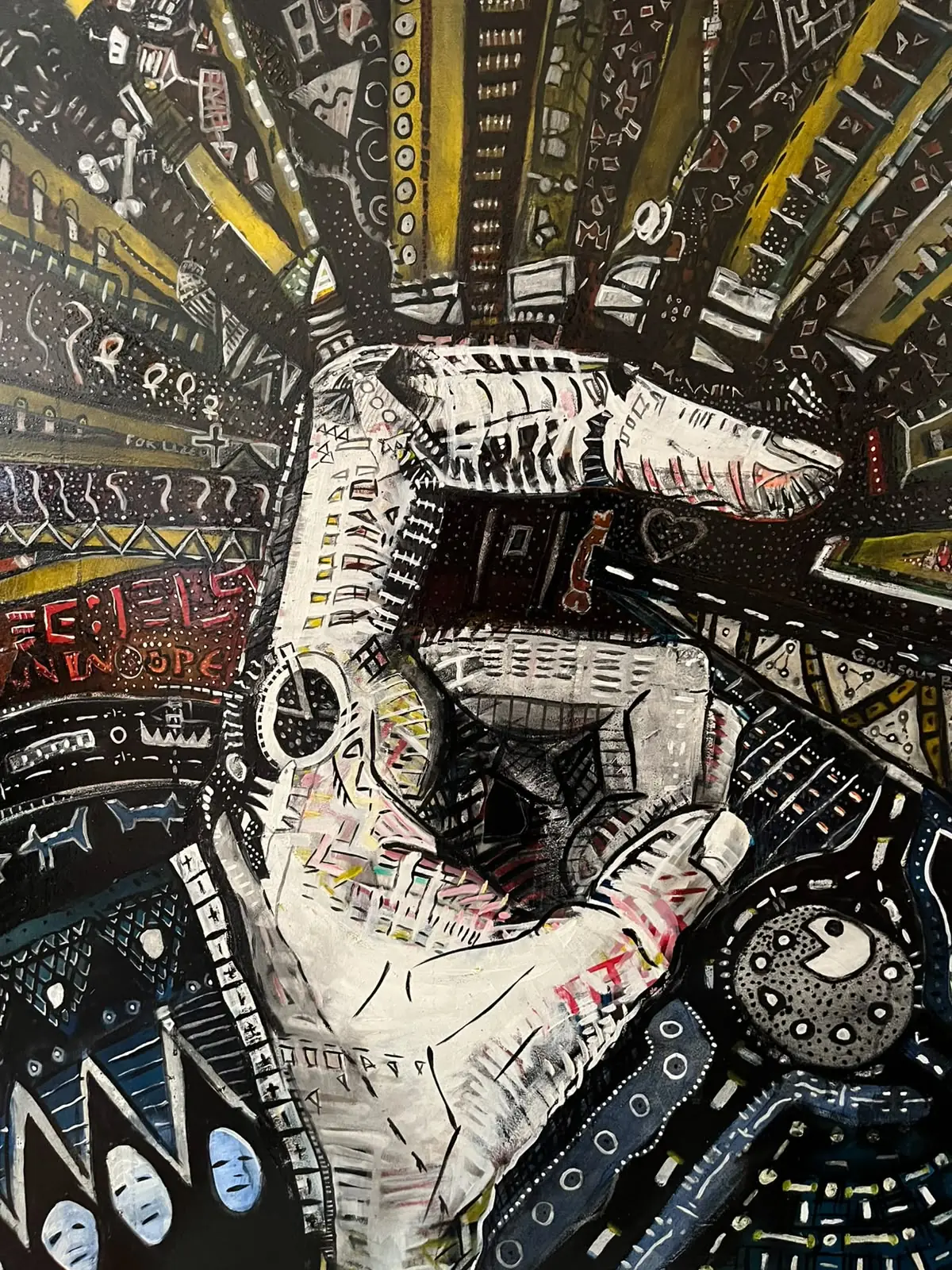 Detail — skeletal hand radiating yellow beams, the kwaal sign